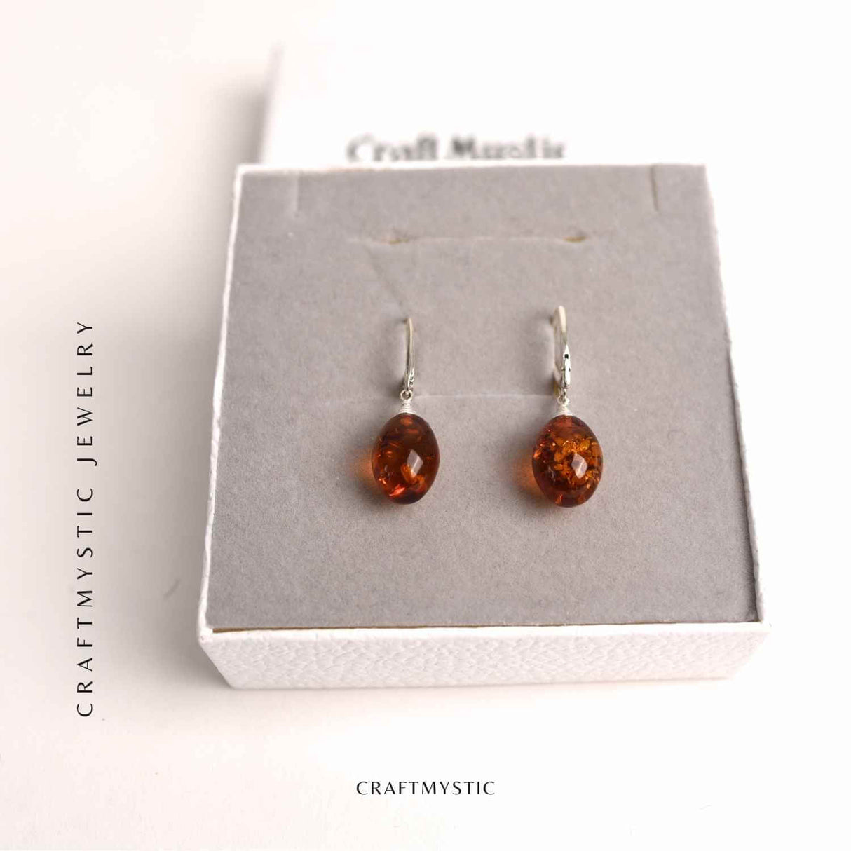 Cercei Ovali din argint 925 cu Chihlimbar Natural – Protectie si Eleganta