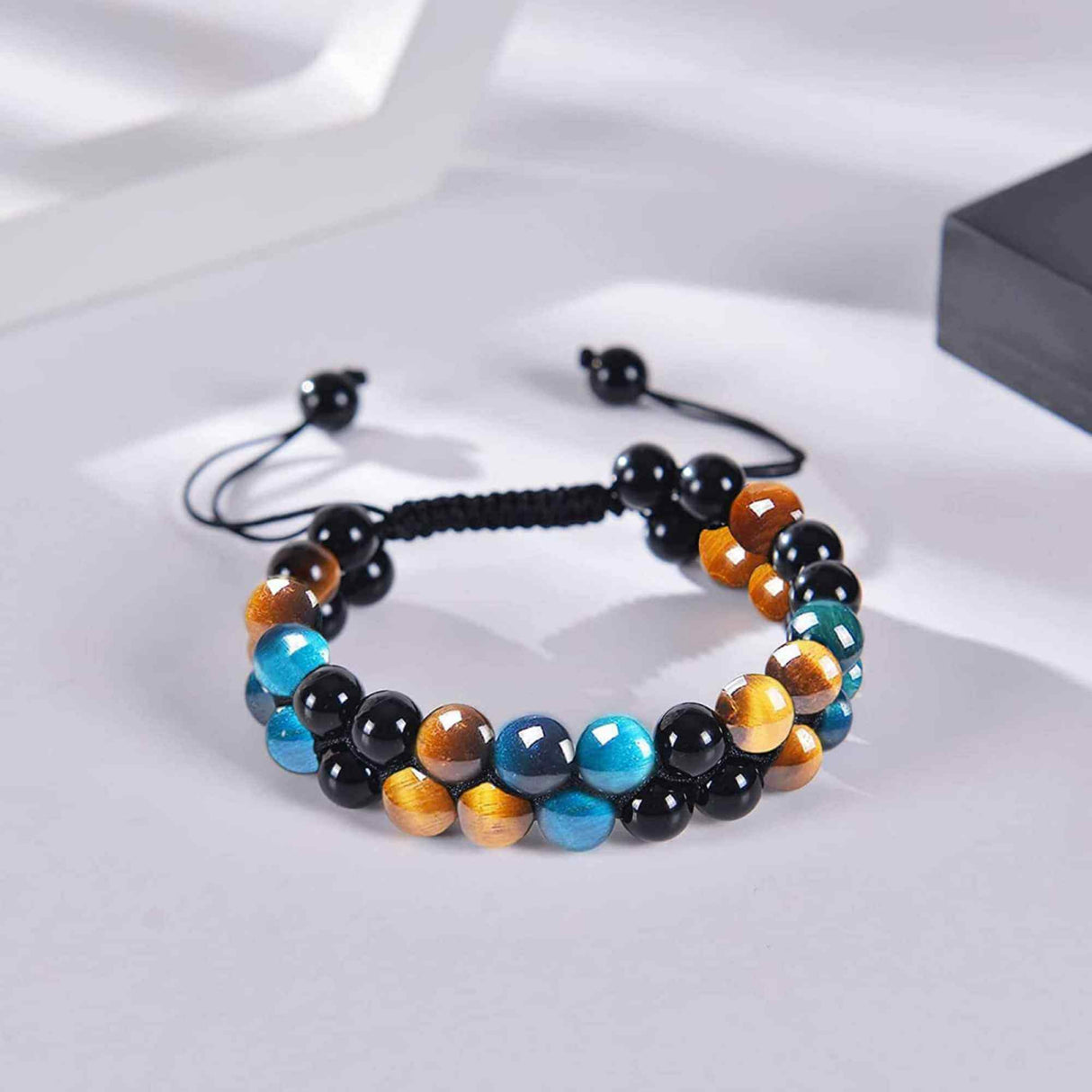 Bratara energetica cu tripla protectie, realizata din pietre semipretioase Obsidian, Ochi de tigru galben si Ochi de tigru albastru de 8 mm – bratara pentru noroc, protectie, stare de bine