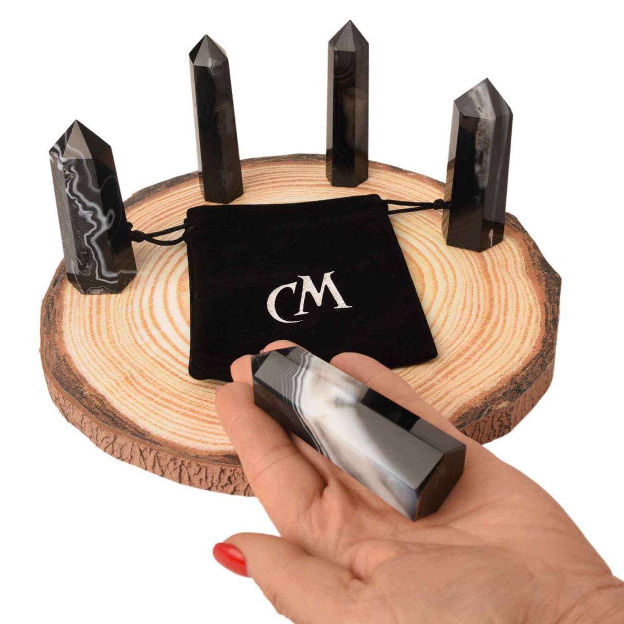 Turn din cristal natural Onyx Agat negru 9-10 cm : Un obiect elegant si puternic pentru protectie si vitalitate