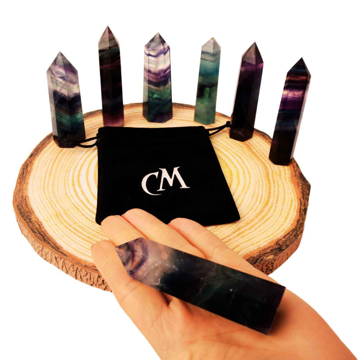 Turn din cristal natural Fluorit Curcubeu 9-10 cm: Adauga un strop de culoare si energie in viata ta